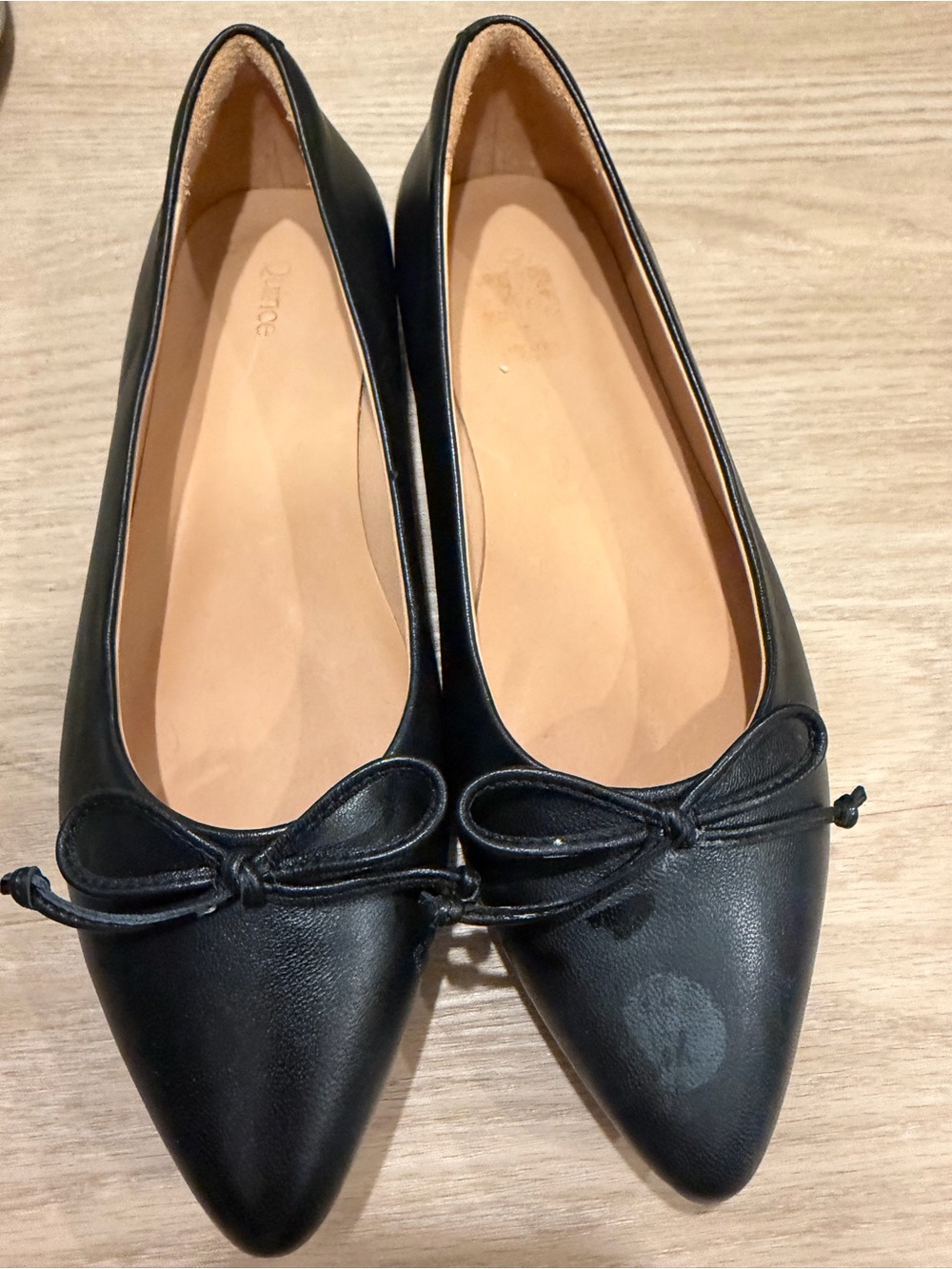 Quince Italian Leathet Black Pointed Toe Ballet Flats with Bow. Sticker mark toe